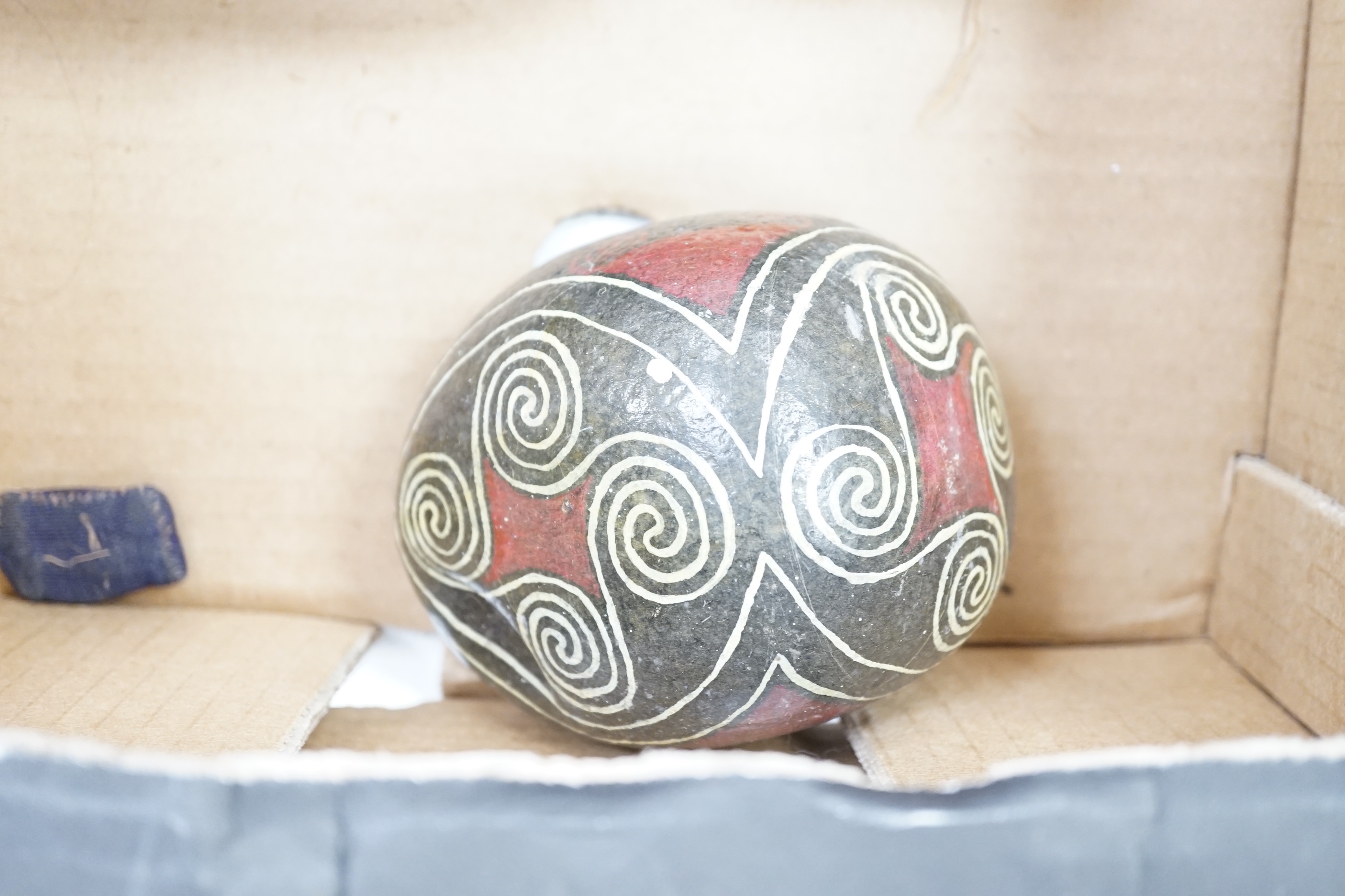 Two Aboriginal boomerangs, an African mask, a painted lion figure and four other items (8)